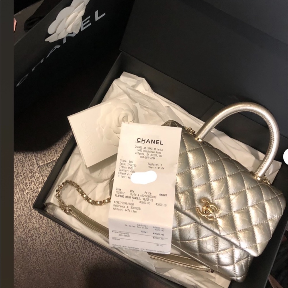 CHANEL
Iridescent Caviar Quilted Mini Coco Handle Flap  special edition